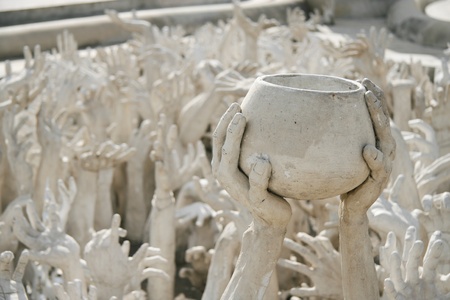 Hands sculpture from hell