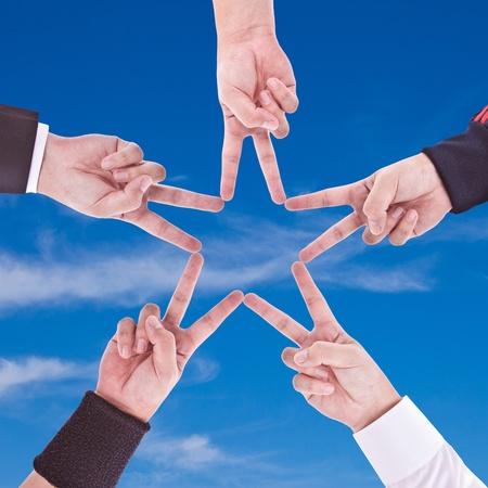 Hands in the form of a starの写真素材