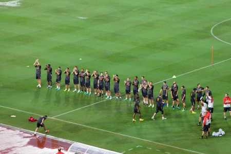 BANGKOK - JULY 28   Liverpool squad thank you fan wave while warm up in the stadium during match between Thai National team and Liverpool FC in LFC Tour 2013 tournament in Bangkok, Thailand during 25-28 July 2013のeditorial素材