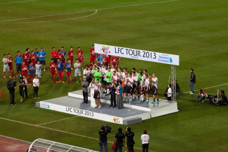 BANGKOK - JULY 28   Steven Gerrard show the trophy after the match between Thai National team and Liverpool FC in LFC Tour 2013 tournament in Bangkok, Thailand during 25-28 July 2013のeditorial素材