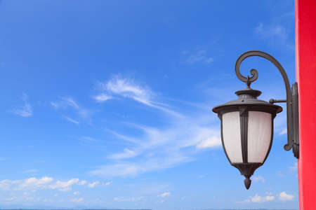 Lamp on red poleの写真素材