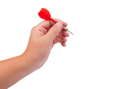 Hand with red dart isolated on white backgroundの写真素材