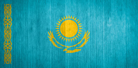 Kazakhstan Flag on wood backgroundの写真素材
