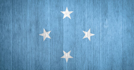 Micronesia Flag on wood backgroundの写真素材
