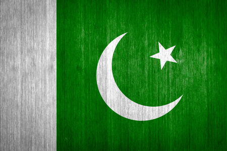 Pakistan Flag on wood backgroundの写真素材