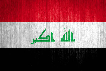 Iraq Flag on wood backgroundの写真素材