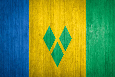 Saint Vincent and the Grenadines Flag on wood backgroundの写真素材