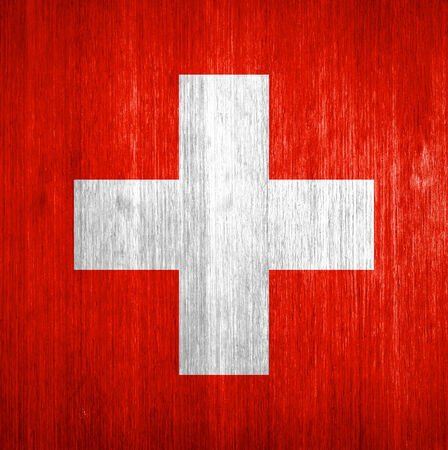 Switzerland Flag on wood backgroundの写真素材