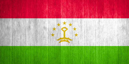 Tajikistan Flag on wood backgroundの写真素材