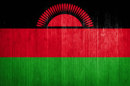 Malawi Flag on wood backgroundの写真素材