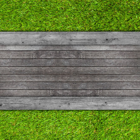 Wooden floor texture on artificial grass backgroundの写真素材