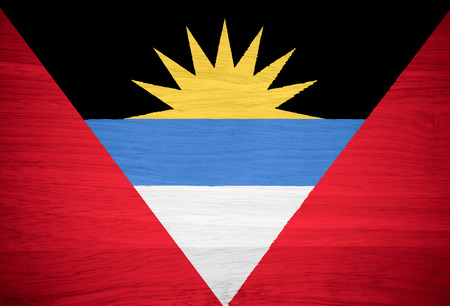 Antigua and Barbuda flag on wood textureの写真素材