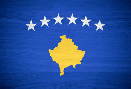 Kosovo flag on wood textureの写真素材