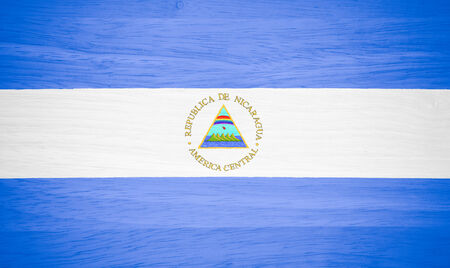 Nicaragua flag on wood textureの写真素材