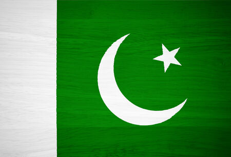 Pakistan flag on wood textureの写真素材
