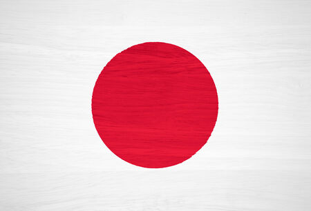 Japan flag on wood textureの写真素材