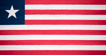 Liberia flag on wood texture