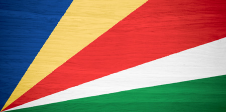 Seychelles flag on wood textureの写真素材
