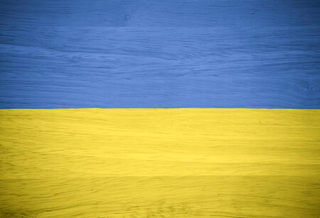 Ukraine flag on wood textureの写真素材
