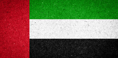 United Arab Emirates flag on paper backgroundの写真素材