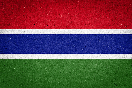 Gambia flag on paper backgroundの写真素材