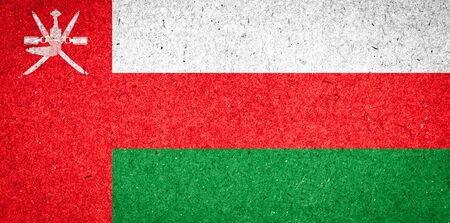 Oman flag on paper backgroundの写真素材