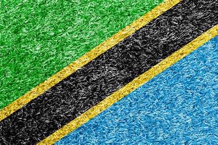 Tanzania flag on grass background textureの写真素材