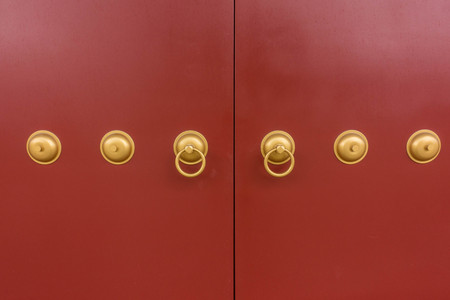 Red Chinese door in a templeの写真素材