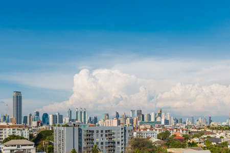 Wide view of building and blue sky with cloudの写真素材