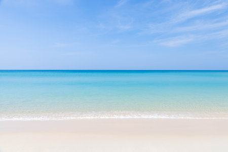Surin beach with blue sky during a sunny day, one of the tourist destination in Phuket, Thailandの写真素材