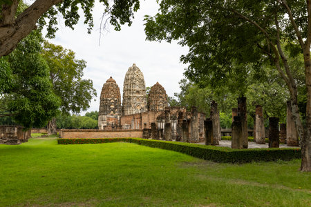 Ancient ruin of temple of Wat Sri Sawai temple in Sukhothai Historical Park, which also one of UNESCO Heritage Siteの写真素材