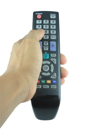 Hand holding remote control  on white backgroundの写真素材
