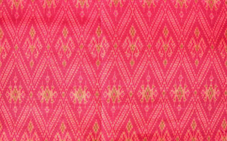 Colorful thai fabric pattern backgroundの写真素材