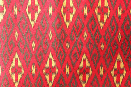 Colorful thai fabric pattern backgroundの写真素材