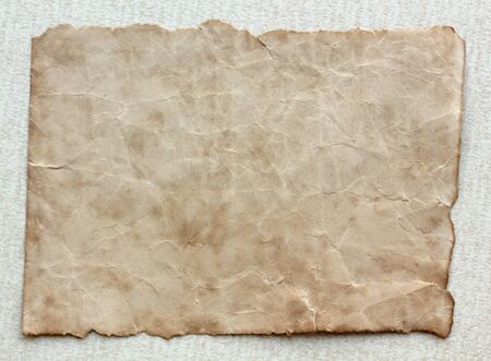 Old paper on a tileの写真素材