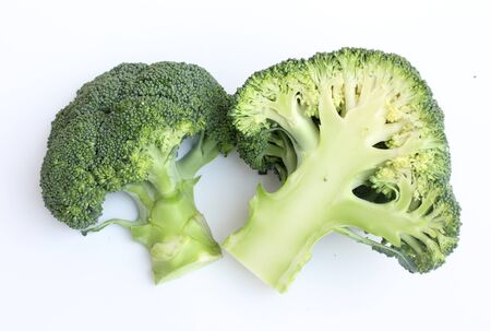 fresh green broccoli on white backgroundの写真素材
