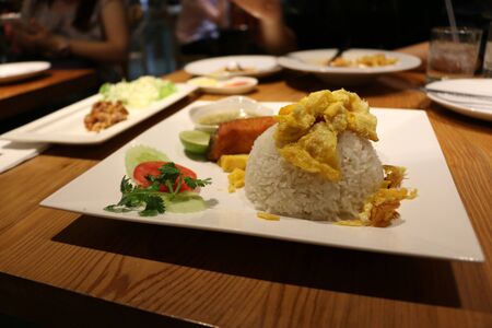 Salmon fried rice on a dishの写真素材