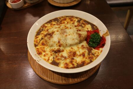 Curried rice with ham and cheeseの写真素材