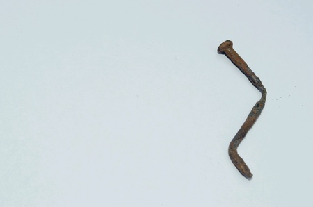Old nail and rusty on white background.の素材