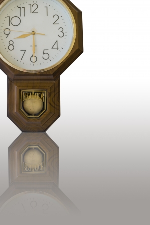 An old clock isolate on white which working hour is about to begin at 8 30 AM の写真素材