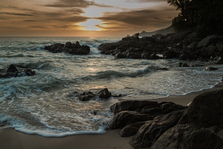 sunset at kalim beach, phuket, thailandの写真素材