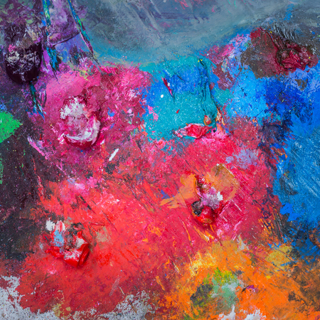 texture of stained palette and oil colorsの写真素材