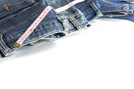 close up jeans trousers with tape isolated on whiteの写真素材