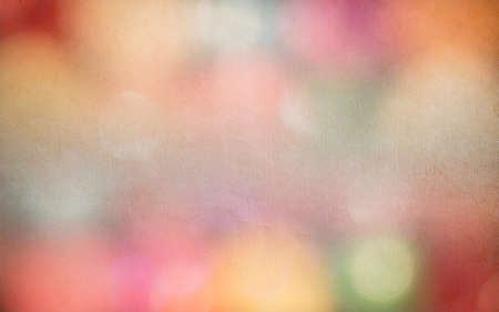 Texture of colorful bokeh on old paper backgroundの写真素材