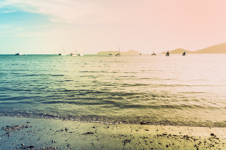 Scenery of Ao Yon Bay with many boat under warm sunlight, Phuket, Thailandの写真素材