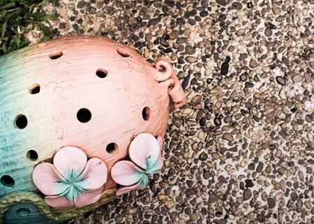 Ceramic object for garden decoration on the floor backgroundの写真素材