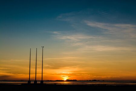 Scenery of seascape during sunrise with dramatic sky