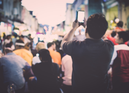 Abstract night festival event with blurred people backgroundの写真素材