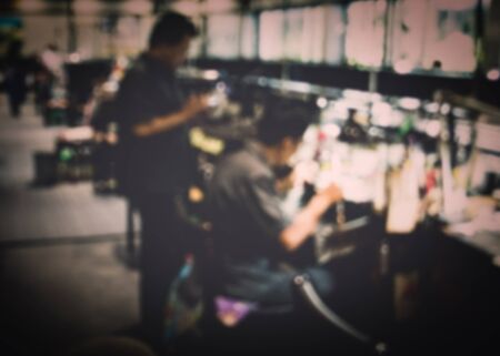 Jewelry factory with blurred workers background in vintage styleの写真素材