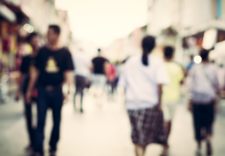 Blurred people walking on the street of phuket old town for backgroundの写真素材